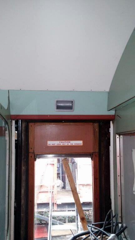 Class 105: New panel and pass com box above a vestibule door