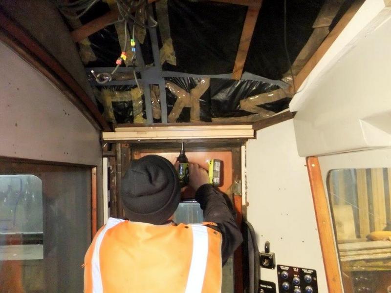 Class 105: Installing the timber ceiling support over the driver's door