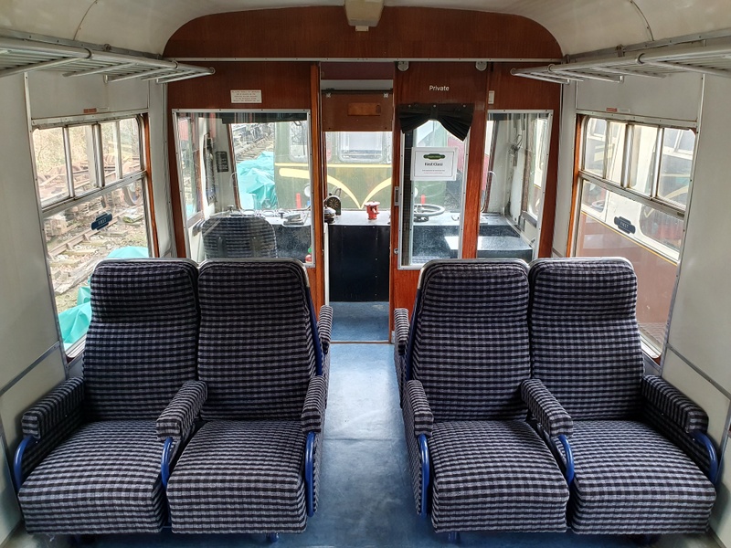 Class 108: Grey reupholstered seats in the first class section of the trailer car