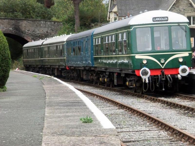 4-car unit comprising the hybrid class 104/108 and the class 1a08 at Carrog
