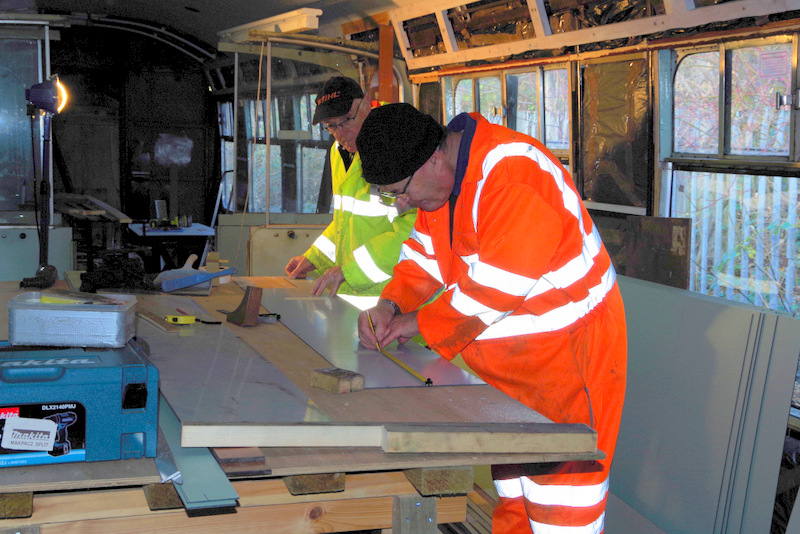 Class 105: Preparing panels to go behind the luggage rack