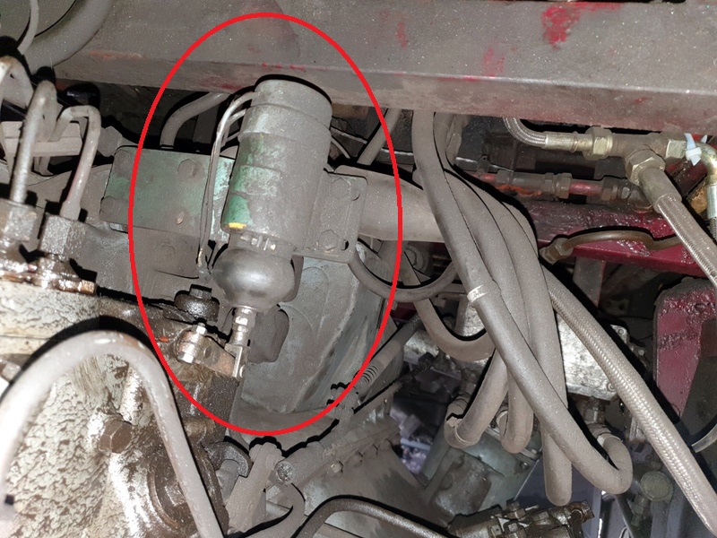 Class 109: Engine stop solenoid and the replacement stop arm on the fuel pump