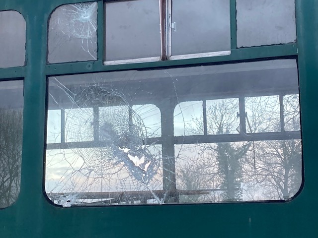 Class 100: Broken window caused by vandalism