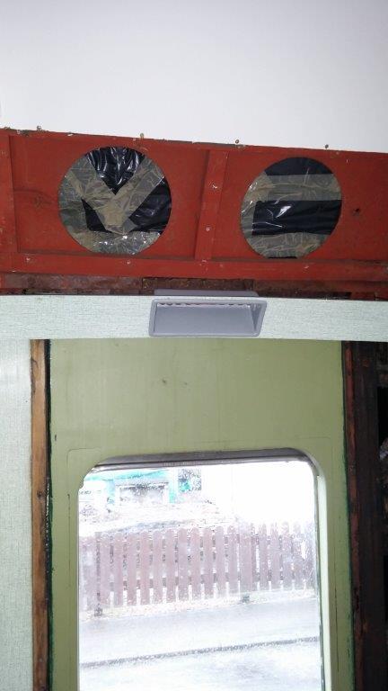 Class 100: Trial fitting of a pass com box above a vestibule door