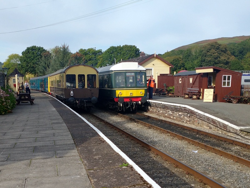 Class 104 + observation coach passing the class 108 at Glyndyfrdwy on 08/10/23