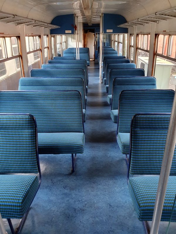 Class 108: Blue/green reupholstered seats in the standard class section of the trailer car