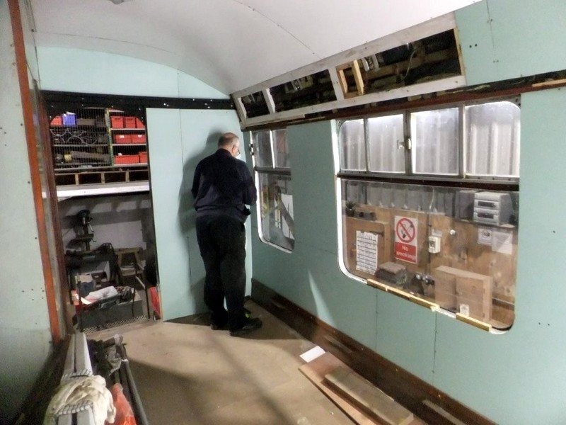 Class 105: Finishing touches to the final wall panel on the driver's side of the rear compartment