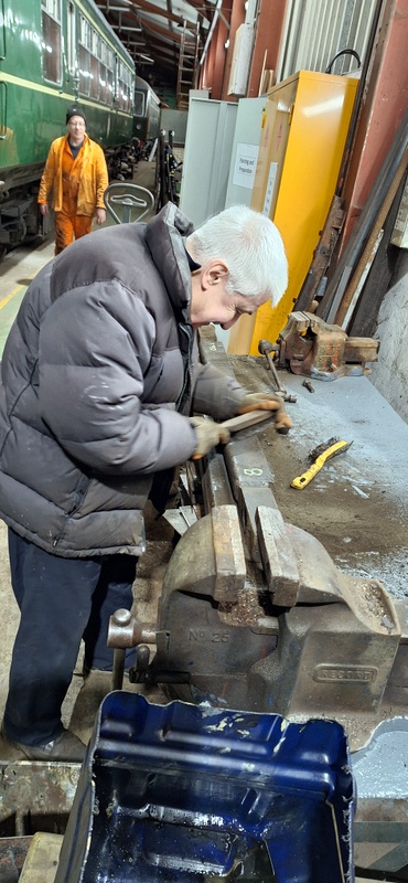 Class 109: Cleaning items of brakegear from the no. 1 bogie of 50416