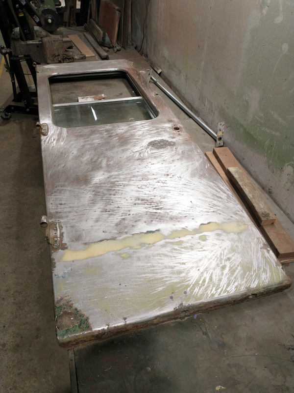 Class 105: Door following the removal of the paint