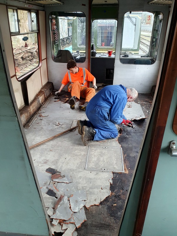 Class 110: Removing lino from a first class saloon