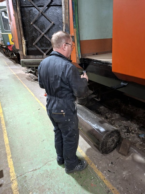 Class 105: Painting woodwork around one of the doors