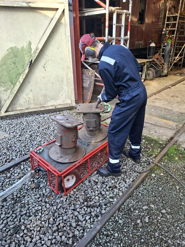 Class 105: Needle gunning the buffers from the back of the vehicle
